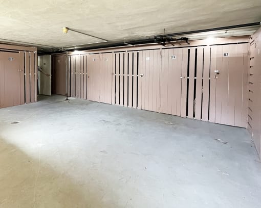 the inside of a building with rows of lockers
