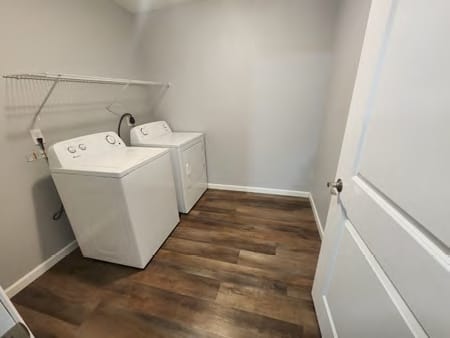 A laundry room with a washer and dryer.