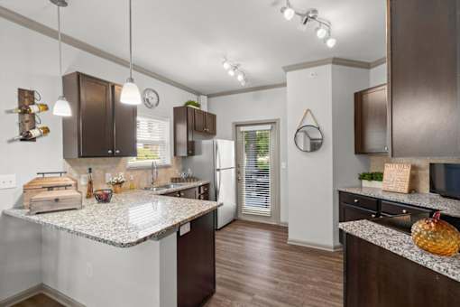 our apartments offer a kitchen at Stonepost Crossing Apartments, Overland Park, Kansas