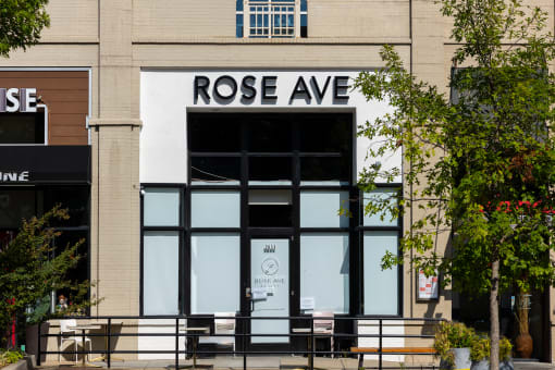 the front of rose ave in front of a building