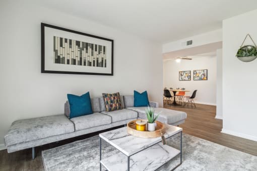 a living room with a couch and a coffee table