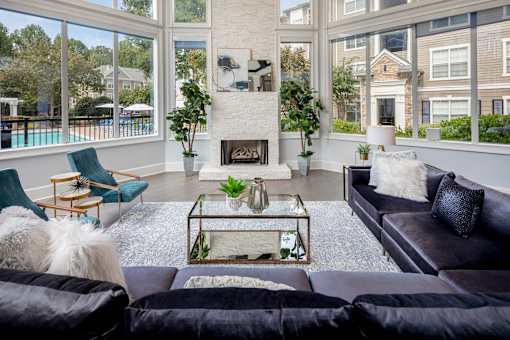 A living room with a fireplace and a couch.