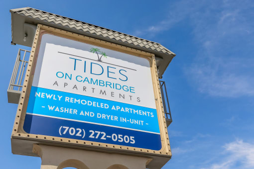 a sign for tides on cambridge apartments