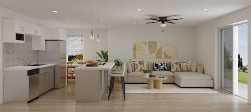 A modern kitchen with a dining area and a living room.