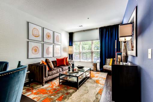 a living room with a couch and a table