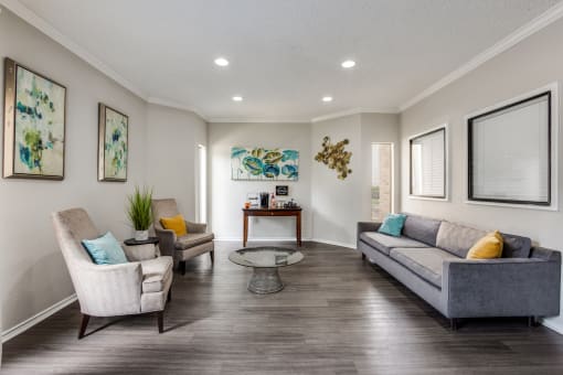 the living room of a new home with couches and chairs