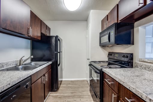 our apartments have a modern kitchen with stainless steel appliances and granite counter tops