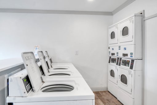 the preserve at ballantyne commons apartment laundry room with washer and dryer