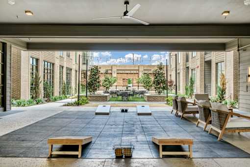A patio with a table and chairs is shown.