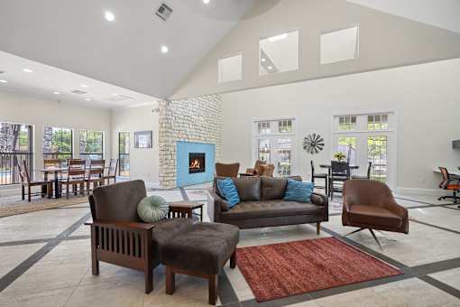 A living room with a fireplace and a couch.