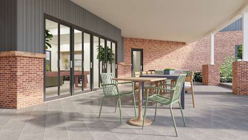 A patio with a table and chairs is shown.