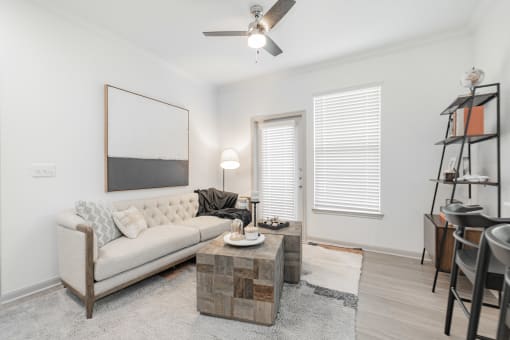 a living room with a couch and a coffee table