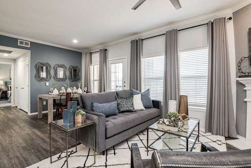 a living room with a couch and a table