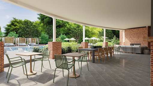 A patio with a table and chairs is shown.