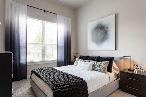 guest bedroom with portrait accents