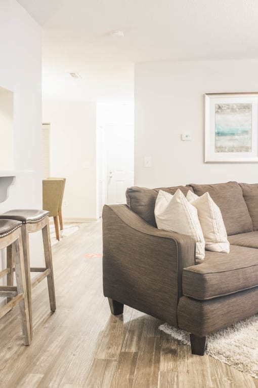 a living room with a couch and a table