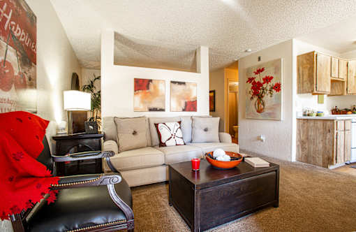 a living room with a couch and a coffee table