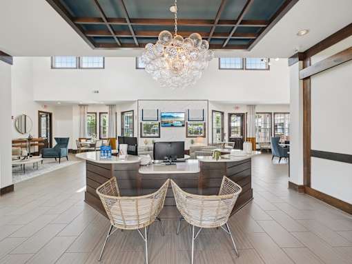 Resident clubhouse and leasing lounge at Village at Broadstone Station apartments in Apex, NC