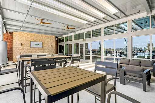 A patio with a table and chairs is shown.