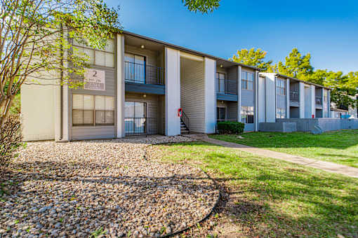 Apartment building number 2 is shown with a clear blue sky in the background.