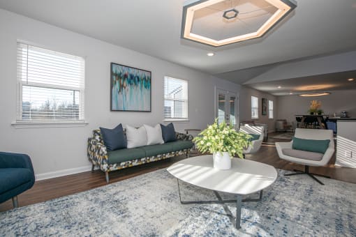a living room with a couch and a table