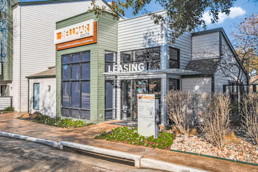 A building with a sign that says "Leasing" is shown.