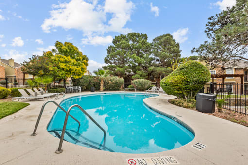 the sparkling swimming pool at our apartments
