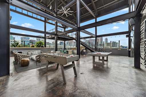 A room with a table and chairs in it.