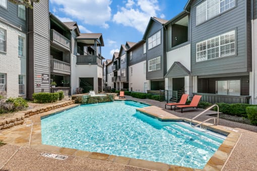 our apartments have a pool and lounge chairs