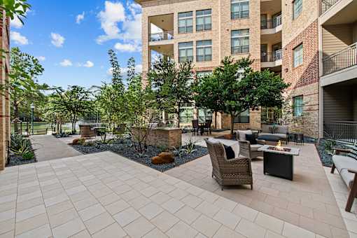 the preserve at ballantyne commons courtyard with furniture and trees
