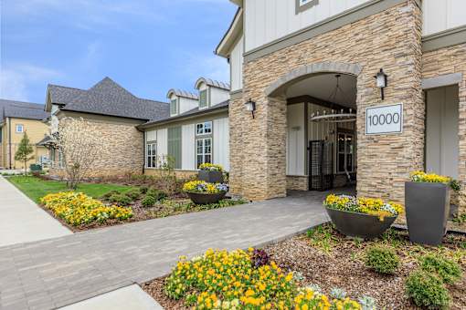 A stone building with a sign that says 10001.