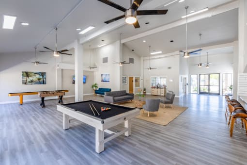 the preserve at ballantyne commons community room with billiards table
