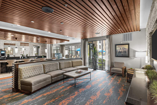 a lobby with couches and a coffee table