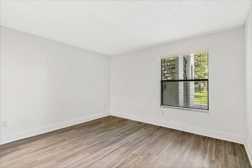 renovated bedroom with all vinyl wood plank flooring