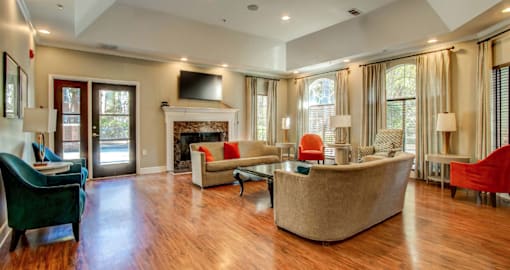 A living room with a fireplace and a couch.