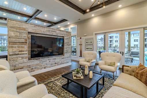 A living room with a fireplace and a couch.