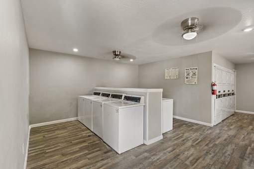 A laundry room with a washer and dryer.