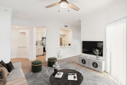 a living room with a couch and a tv