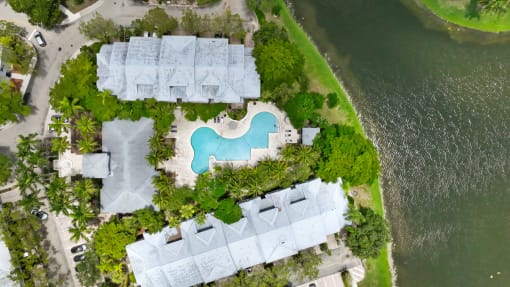 a birds eye view of the resort with a swimming pool