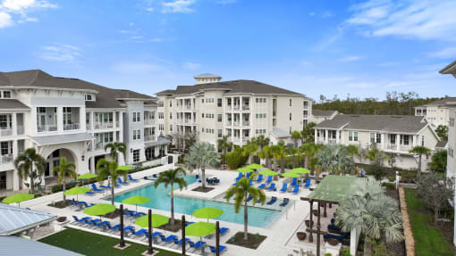 an aerial view of the pool at the resort at longboat key club