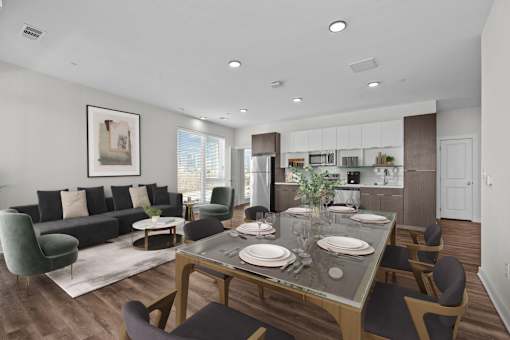 A modern dining room with a glass table and chairs.