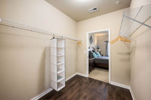 A room with a white ladder against the wall.