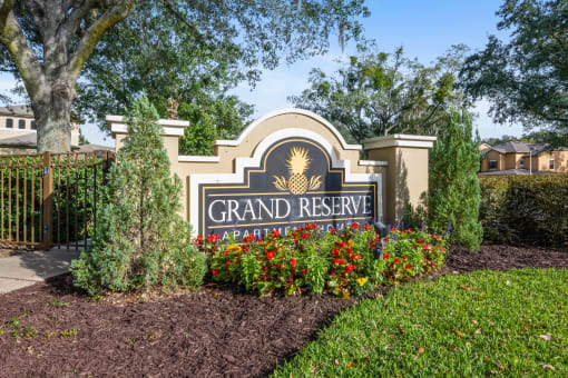 the sign at the entrance to grand reserve apartments