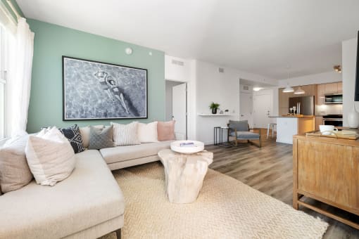 a living room with a couch and a table