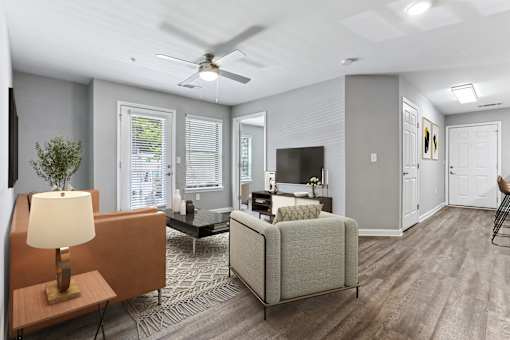 a living room with a couch and a chair