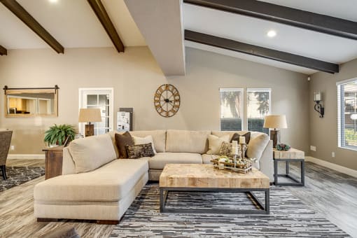 a living room with a couch and a coffee table