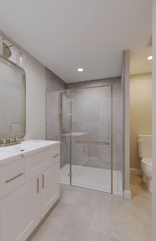 A white bathroom with a walk-in shower.