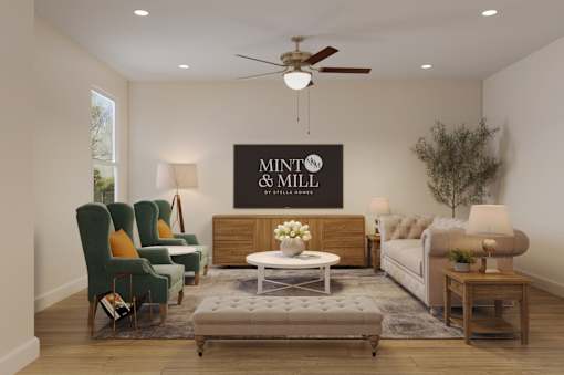 A living room with a sign that says "Mint & Mill" on the wall.