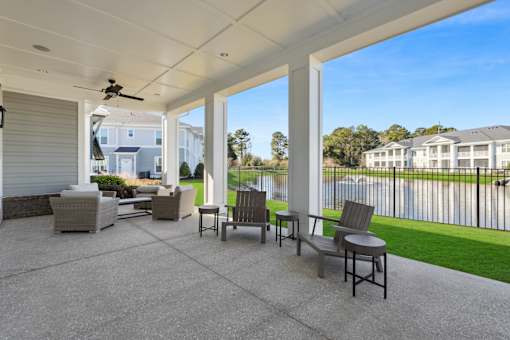 A patio with a table and chairs is shown.