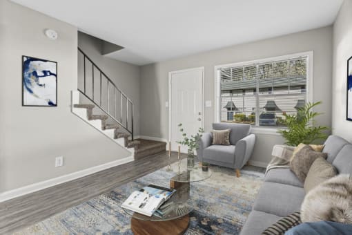 a living room with a couch and a table